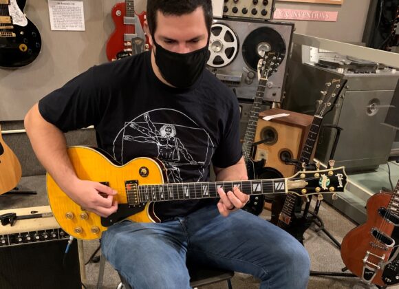 Playing a Les Paul Guitar
