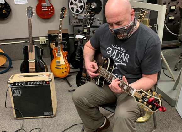 Playing a Les Paul Guitar